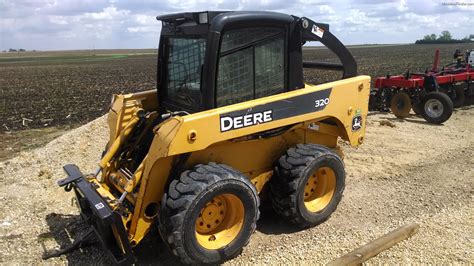 2004 john deere 320 skid steer specs|john deere 320 value.